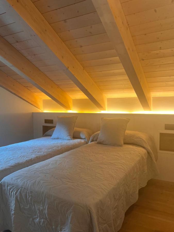 Apartamentos Turisticos: Tu Casa En Sahun Exteriör bild